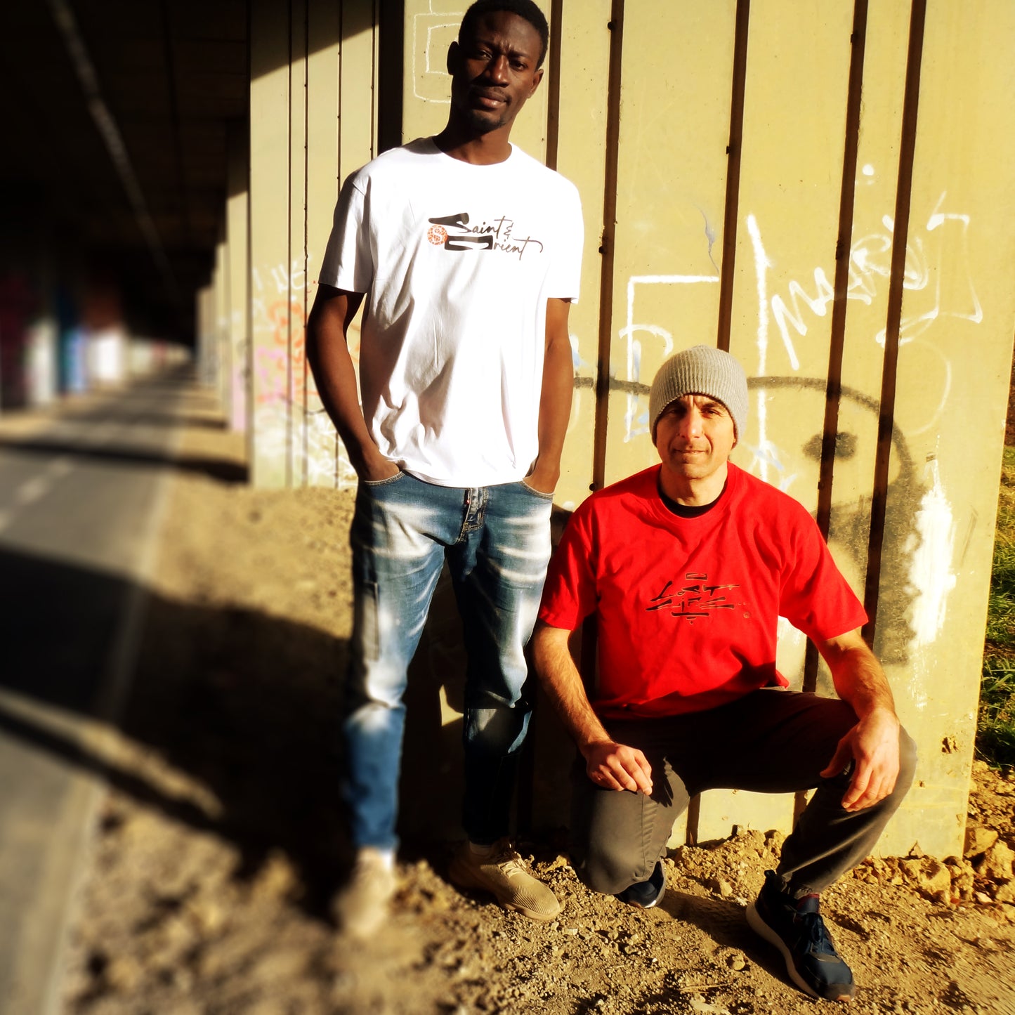 Loose calligraphy graphic on white Saint&Orient tee