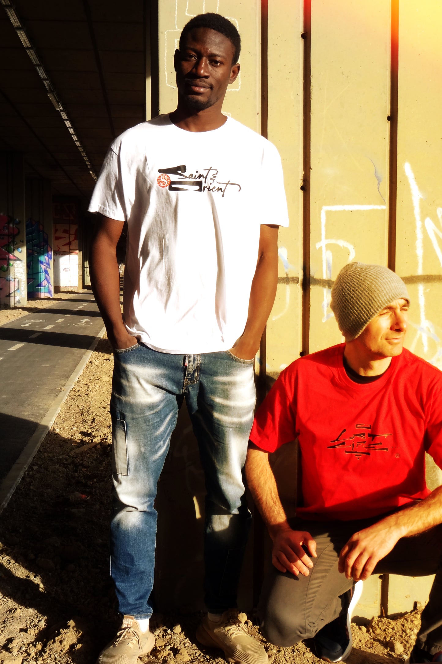 Loose calligraphy graphic on white Saint&Orient tee