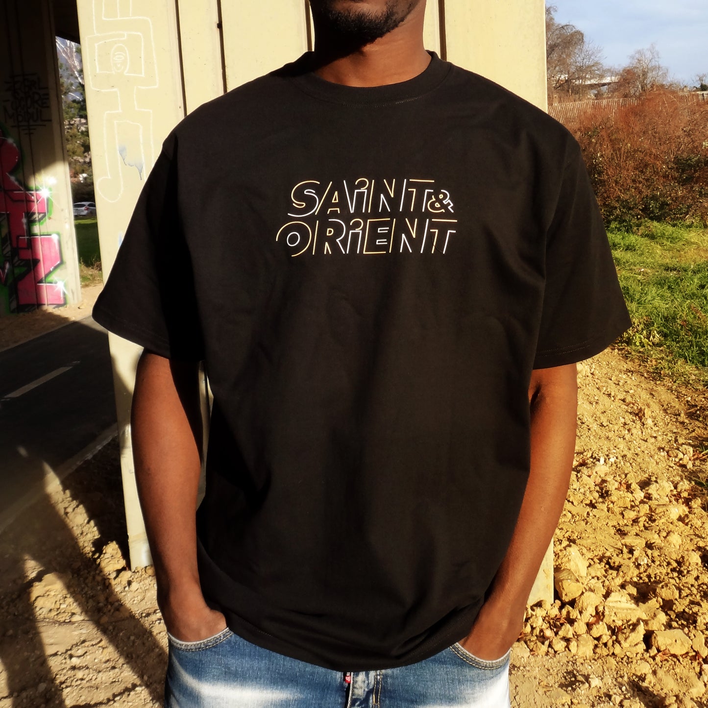 Minimalist urban streetwear tee with subtle graphic on front