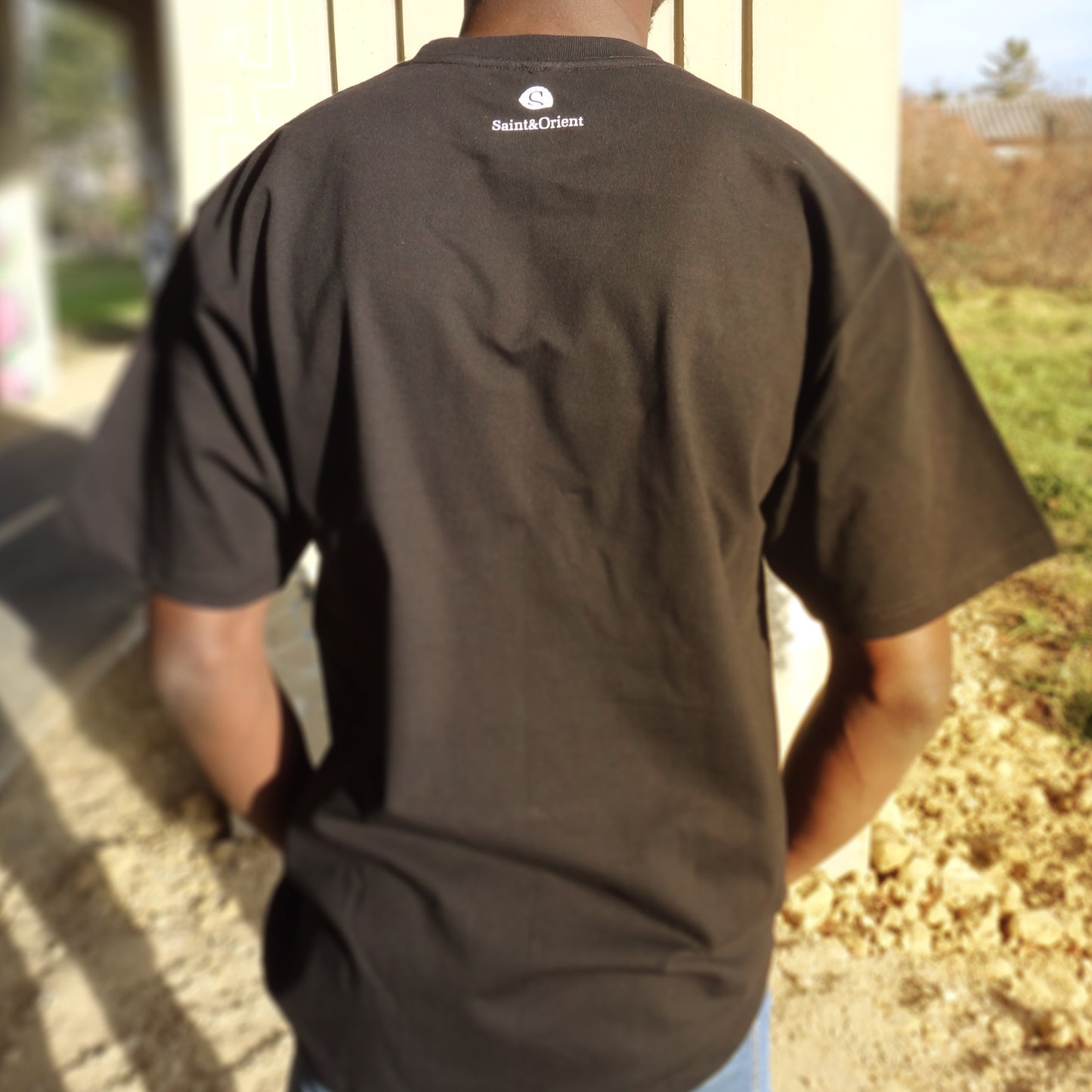 Minimalist urban streetwear tee with subtle graphic on front