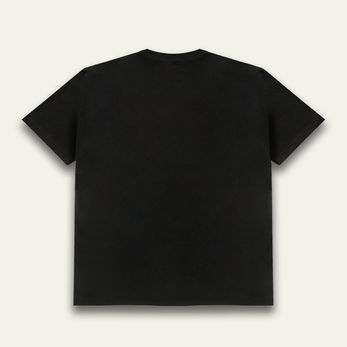 Black t-shirt with playful cartoon skull and graveyard illustration