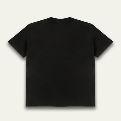 Black t-shirt with playful cartoon skull and graveyard illustration